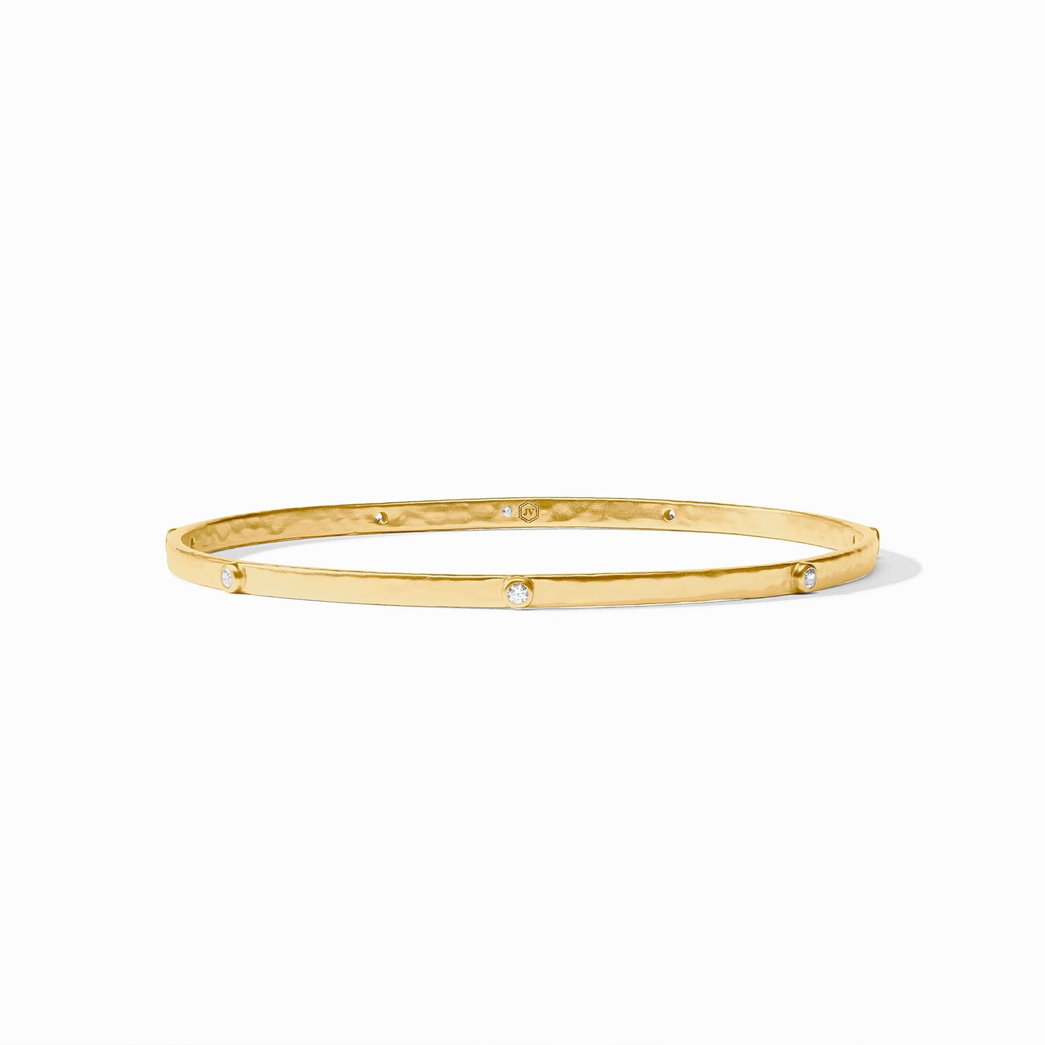 Gold bangle bracelet with evenly spaced round diamonds