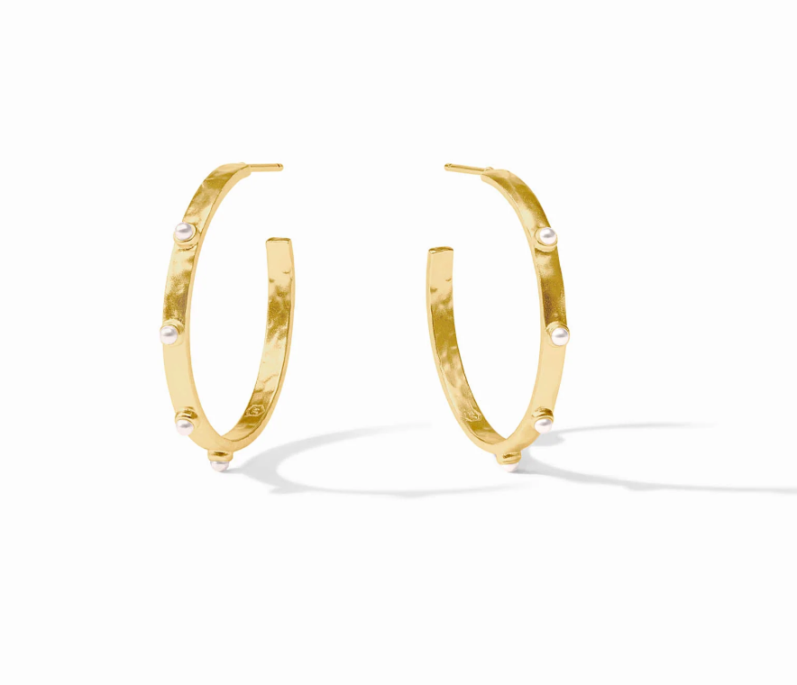 Gold hoop earrings with small white pearls