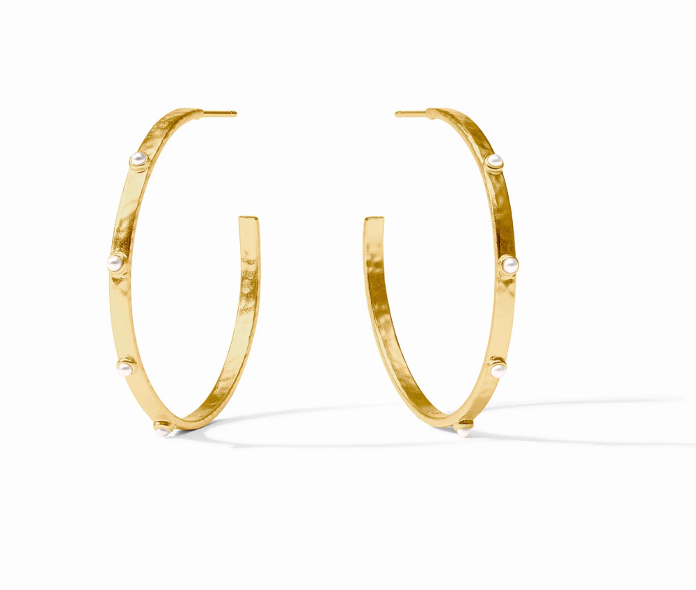Gold hoop earrings with small pearl accents