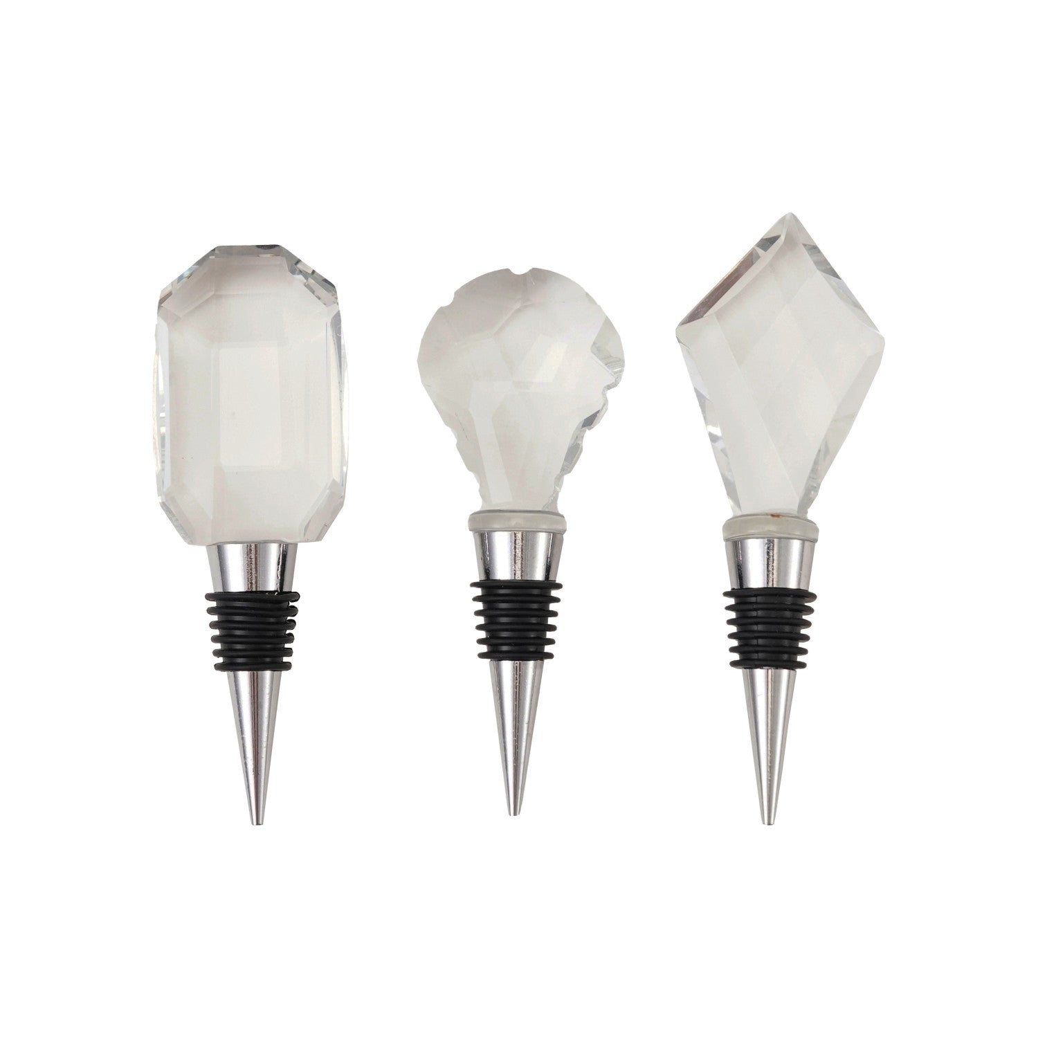 Three decorative wine stoppers with clear faceted crystal tops and silver metal bases