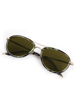 Product Photography a pair of aviator sunglasses featuring green tortoise shell frames gold metal details and dark green lenses