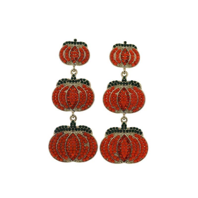 Dangle earrings featuring three stacked orange pumpkin charms with green stems made of crystals