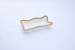 White ceramic rectangular decorative dish with a unique scalloped beaded gold rim and subtle interior embossed pattern