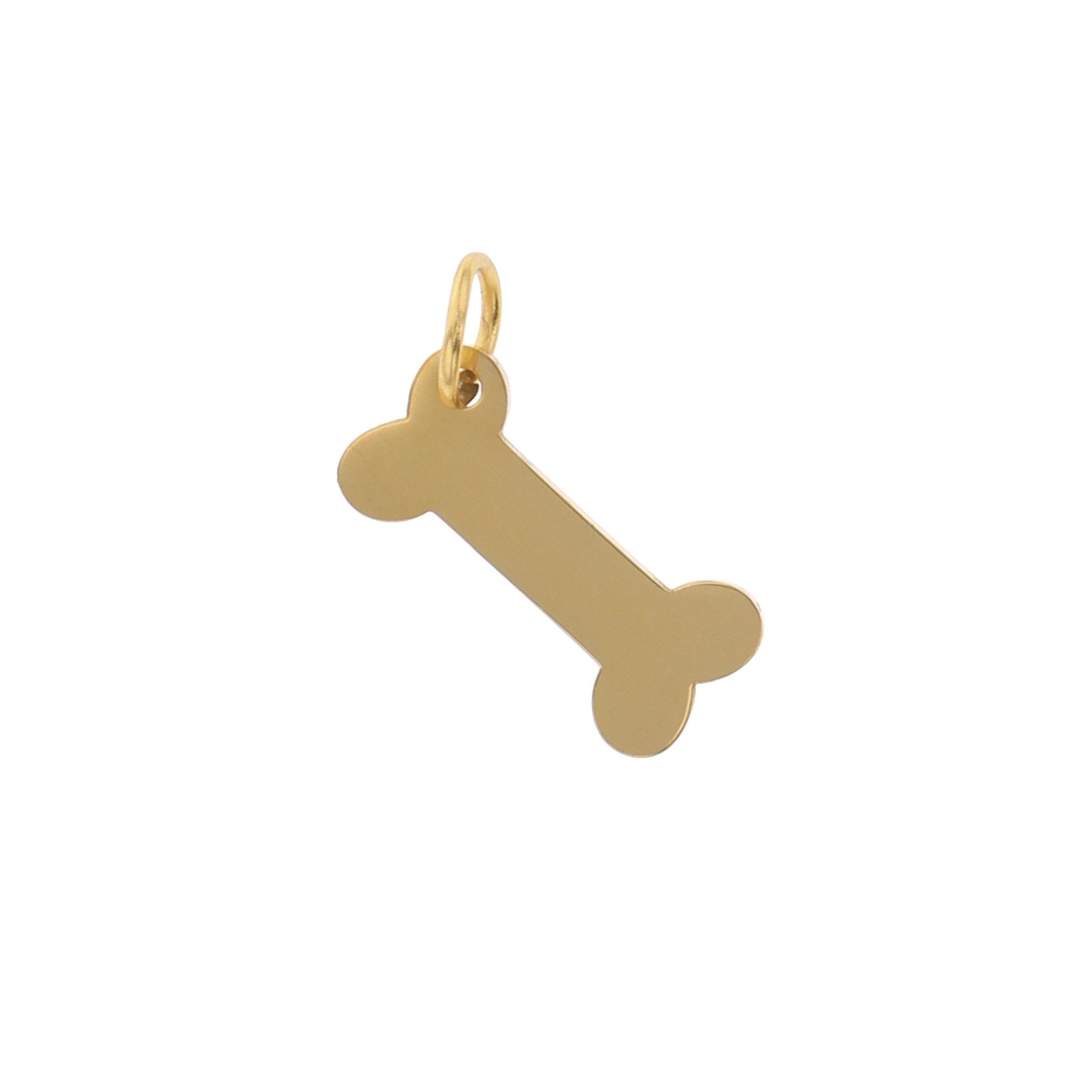Gold charm featuring a polished bone-shaped pendant with a small jump ring isolated on a white background