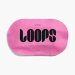 Product image of LOOPS Double Take face mask packaging on a white background, featuring a vibrant hot pink elongated oval pouch with a bold black LOOPS logo and text For Nights Out Special Occasions Rendezvous