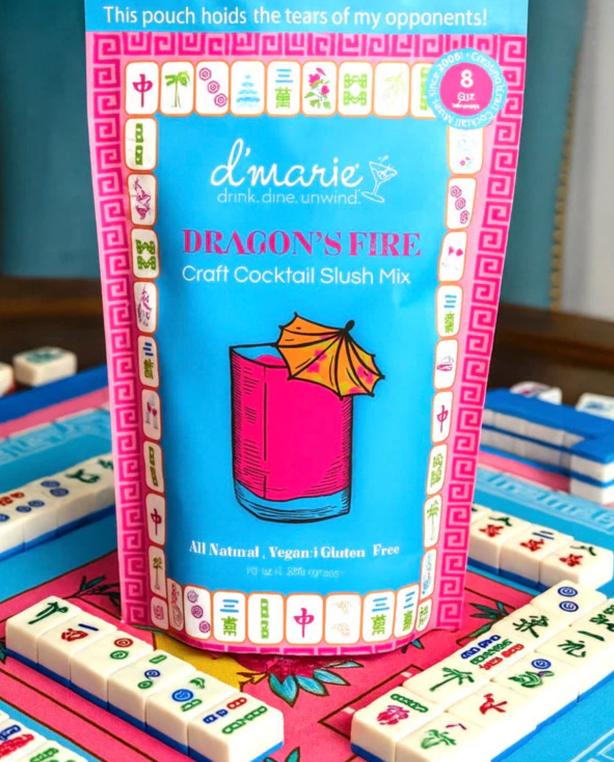 Dragon Fire craft cocktail slush mix pouch on a mahjong board