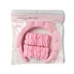 Product photo by Lemon Lavender of a bright pink super soft dryband set featuring a puffy terry cloth headband and two matching wristbands in clear packaging with the phrase I washed up like this