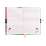 Open whimsical children's diary with lined white pages featuring illustrations of purple mushrooms and tiny ballerinas dancing in colorful tutus, secured by a silver clasp and adorned with pastel ribbon bookmarks