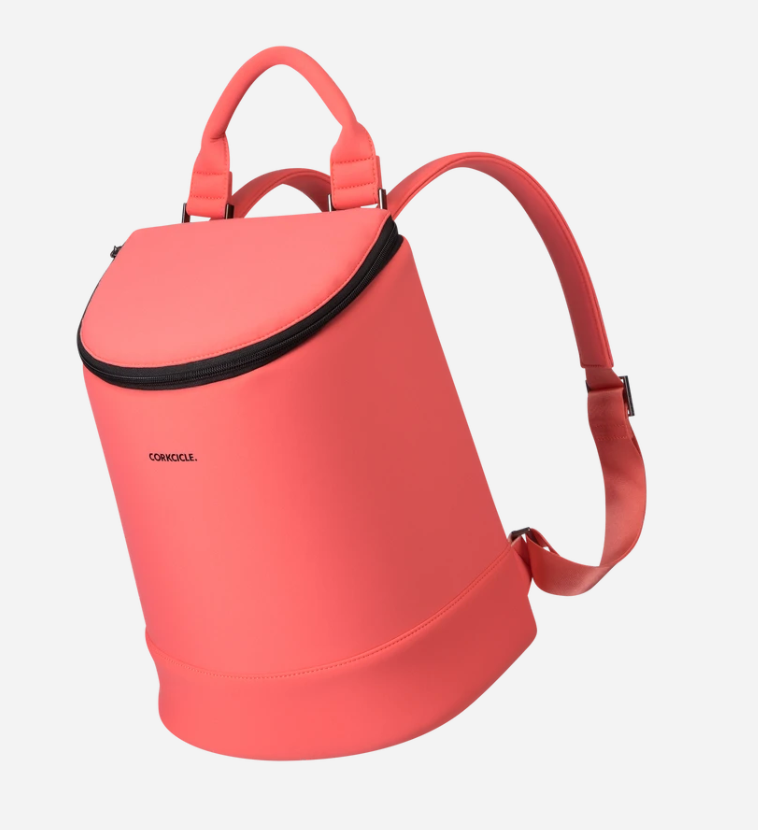 Coral colored Corkcicle backpack cooler with top handle and adjustable shoulder straps