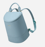 Light blue cylindrical backpack with top handle and adjustable shoulder straps