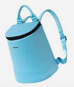 Light blue cylindrical Corkcicle cooler backpack with black zipper and adjustable straps