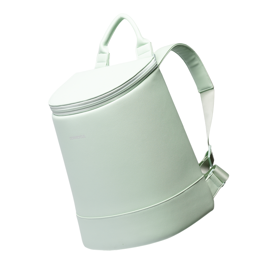 Mint green Corkcicle backpack cooler with top handle and adjustable straps