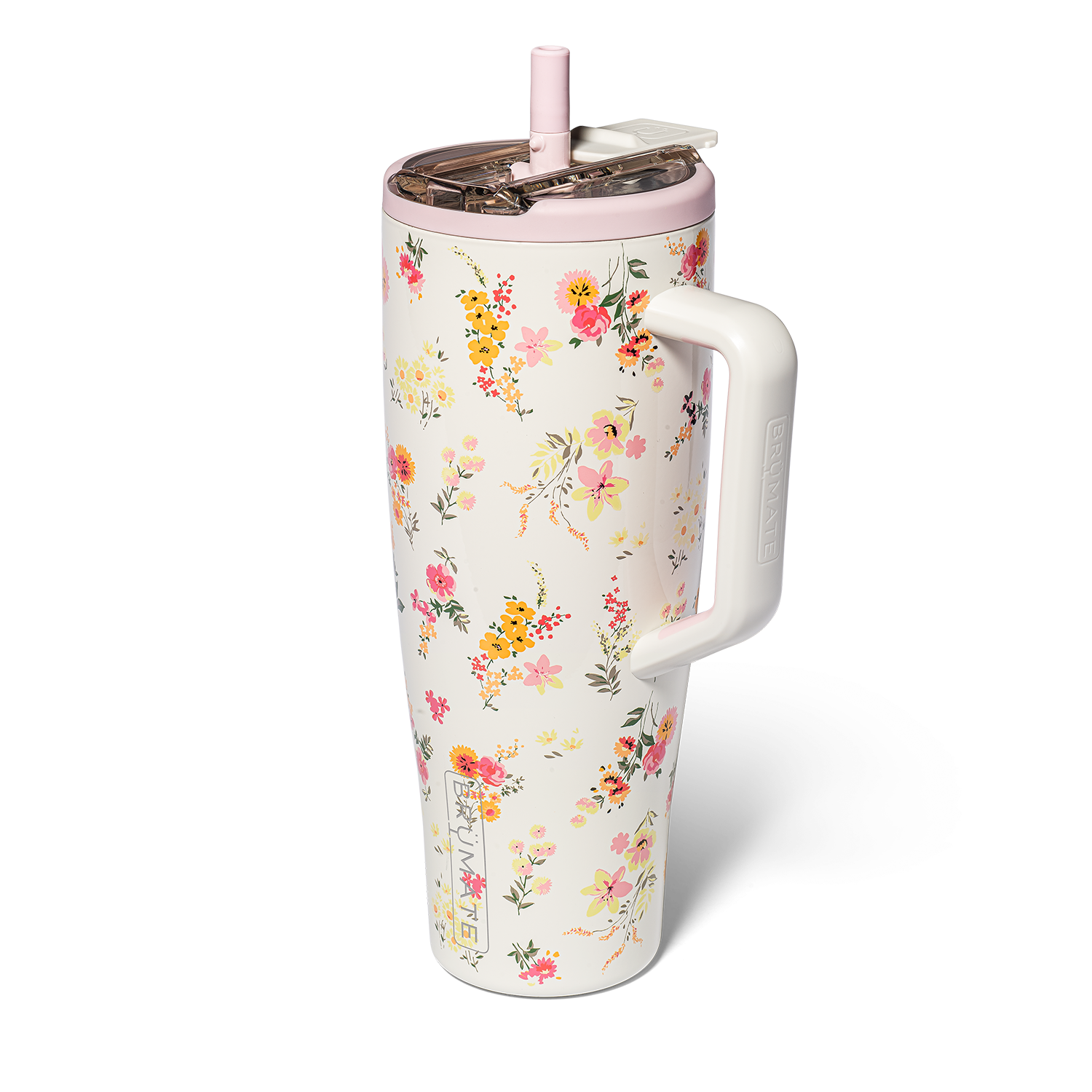 Cream colored tumbler with floral pattern and handle