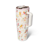 Cream colored Brumate tumbler with floral pattern and white handle