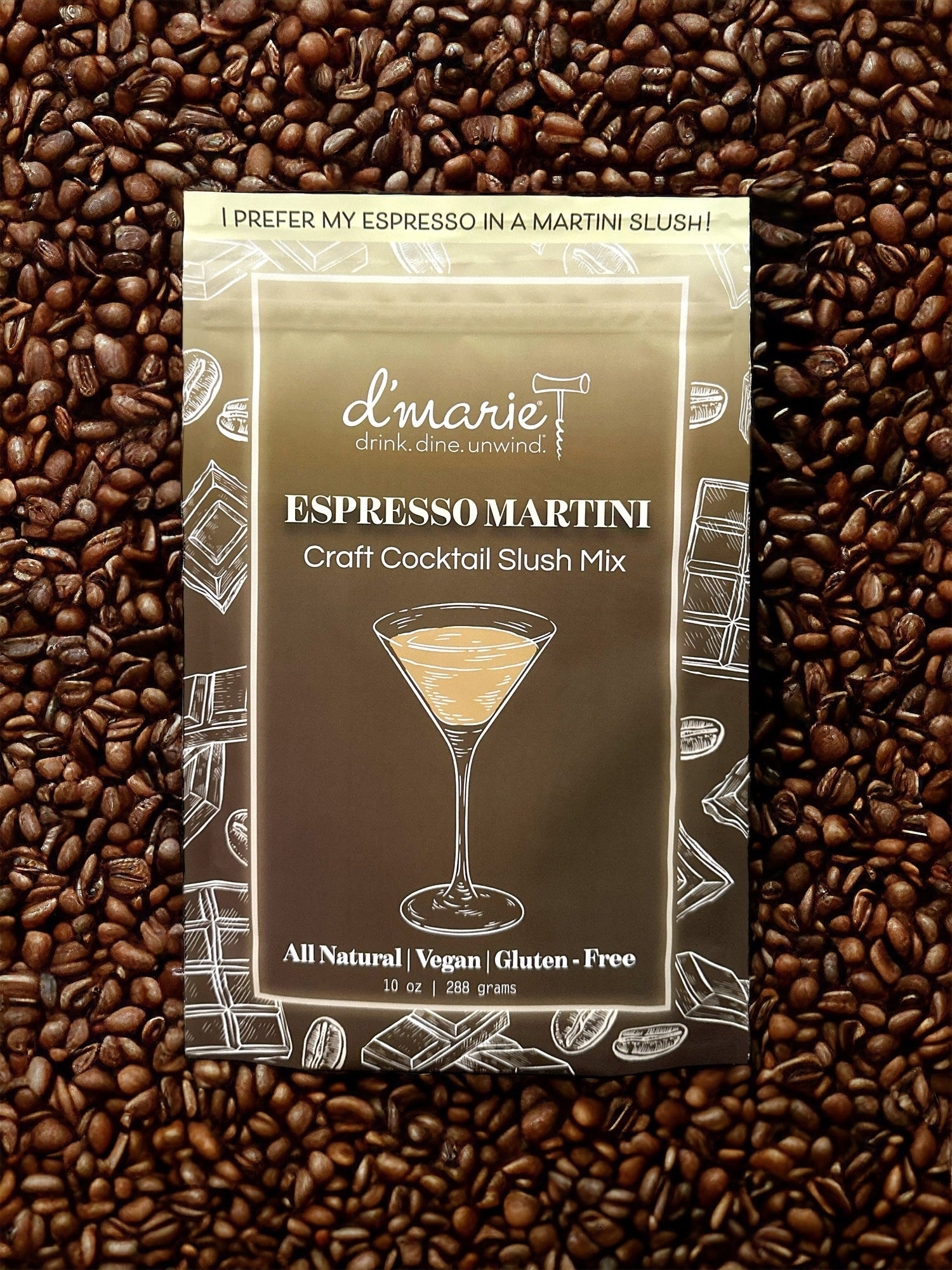 Dmarie espresso martini craft cocktail slush mix pouch on a background of roasted coffee beans