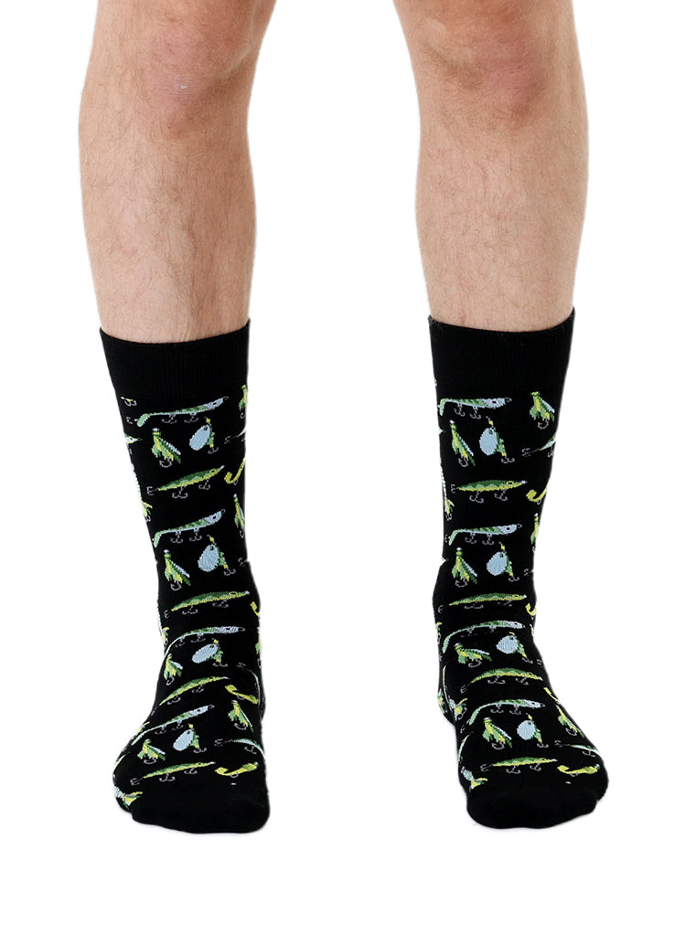 Black crew socks with a repeating pattern of fishing lures and hooks