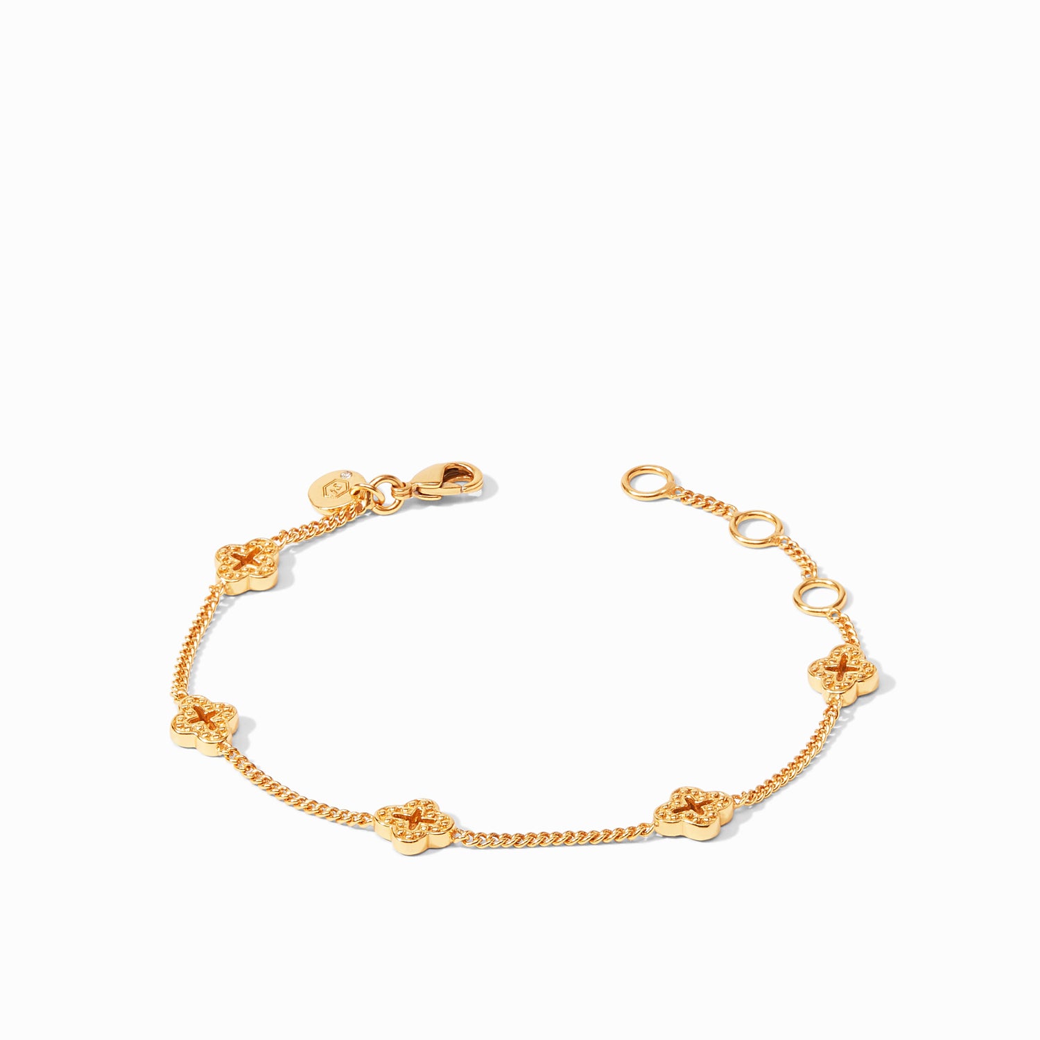Gold chain bracelet with four clover shaped charms
