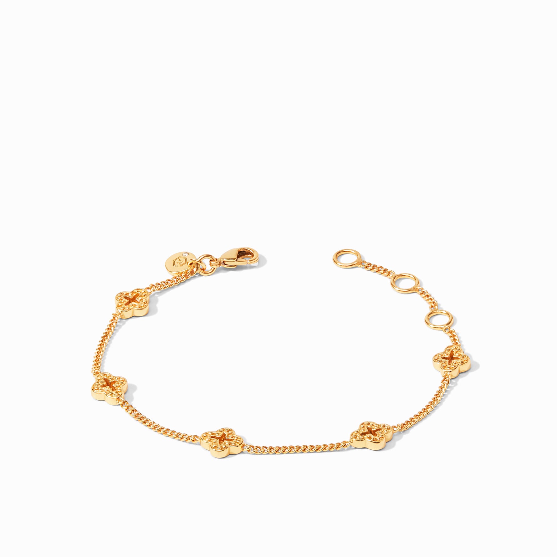 Gold chain bracelet with four clover shaped charms