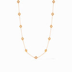 Gold chain necklace featuring nine evenly spaced clover shaped charms