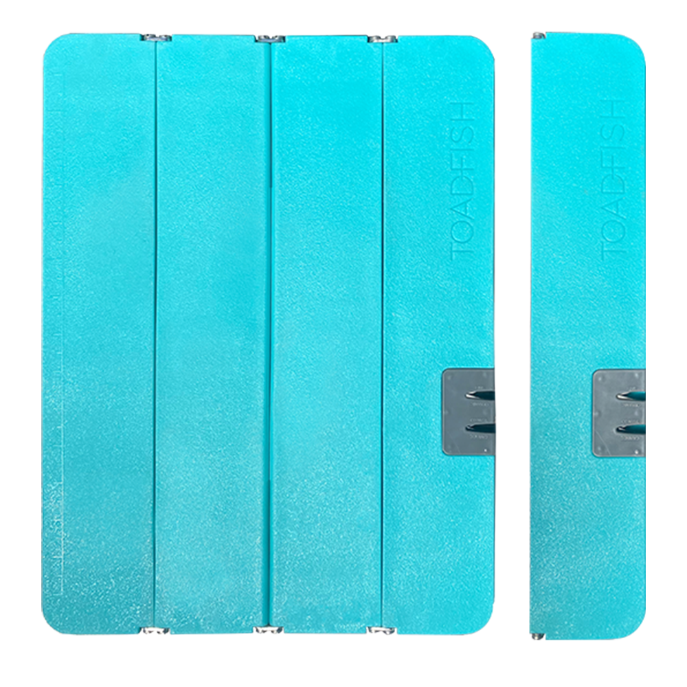 Vibrant aqua blue TOADFISH foldable cutting board featuring magnetic tool holders
