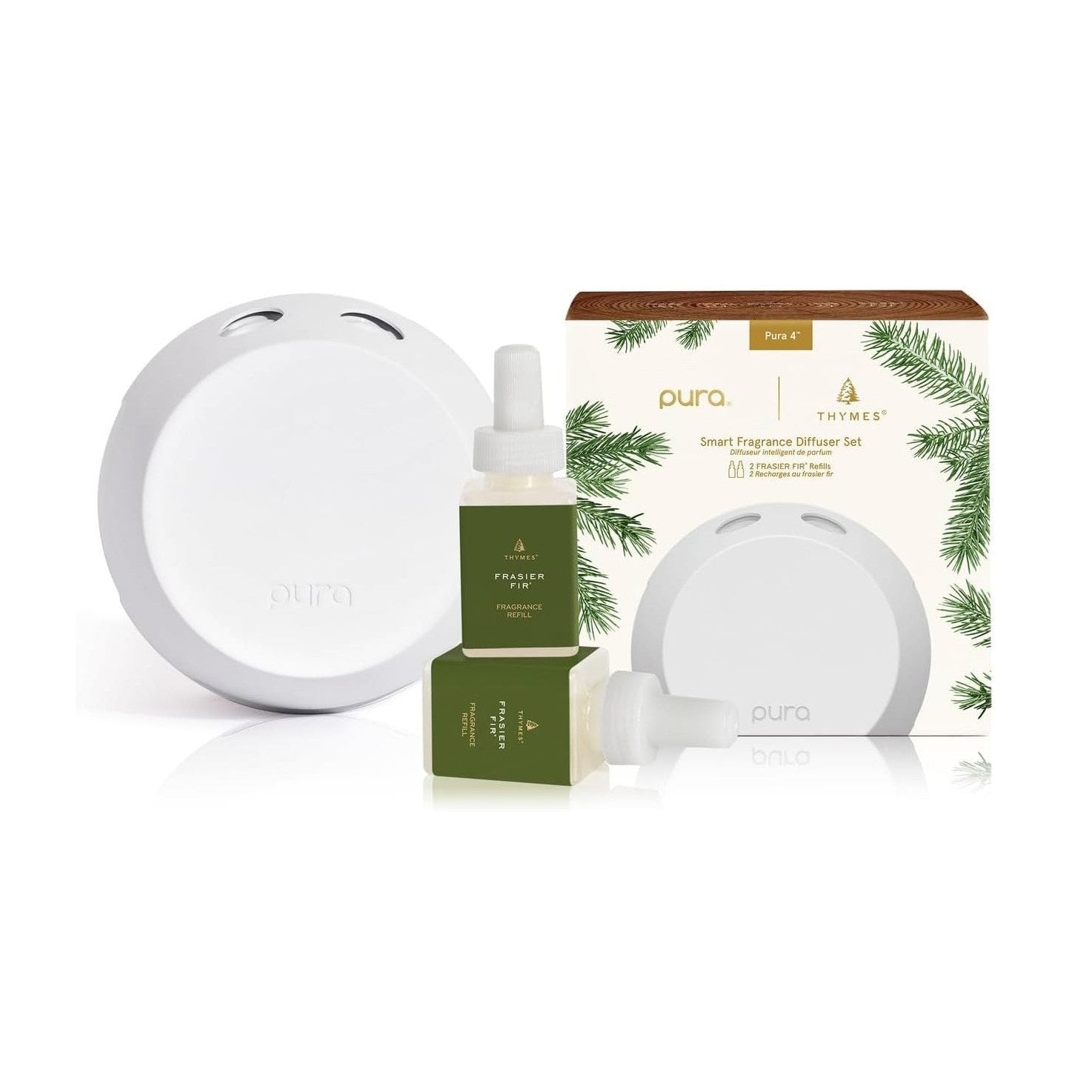 Product Photography by Pura and Thymes showing a Pura Smart Fragrance Diffuser Set with a white Pura 4 device, two green Thymes Frasier Fir fragrance refills, and the product box adorned with pine needle graphics