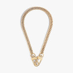 Product image of a shiny gold curb chain strap featuring two attached lobster clasps clearly engraved with MARRIN COSTELLO against a clean white studio background