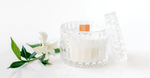 Crystal glass candle jar with wooden wick and white gardenia flower