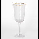 Clear hammered glass wine glass with a gold rim