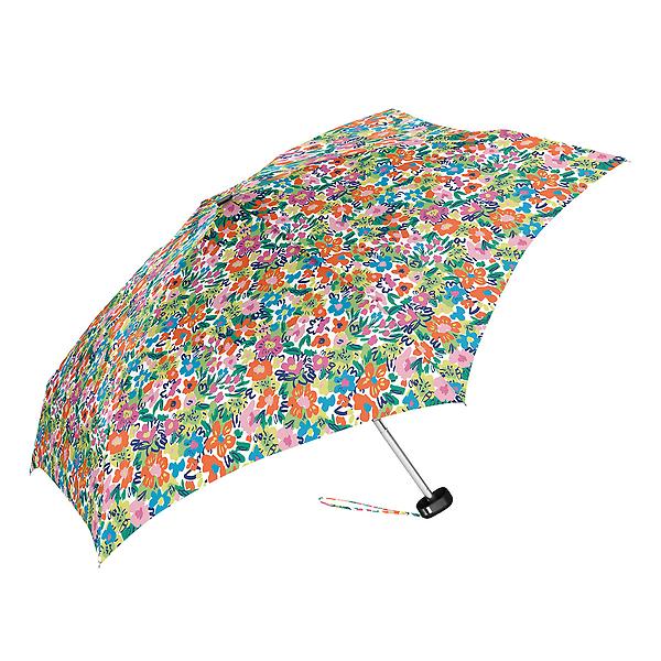 A compact travel umbrella features a vibrant multicolored floral pattern with orange pink blue green and yellow flowers and a coordinating striped wrist strap