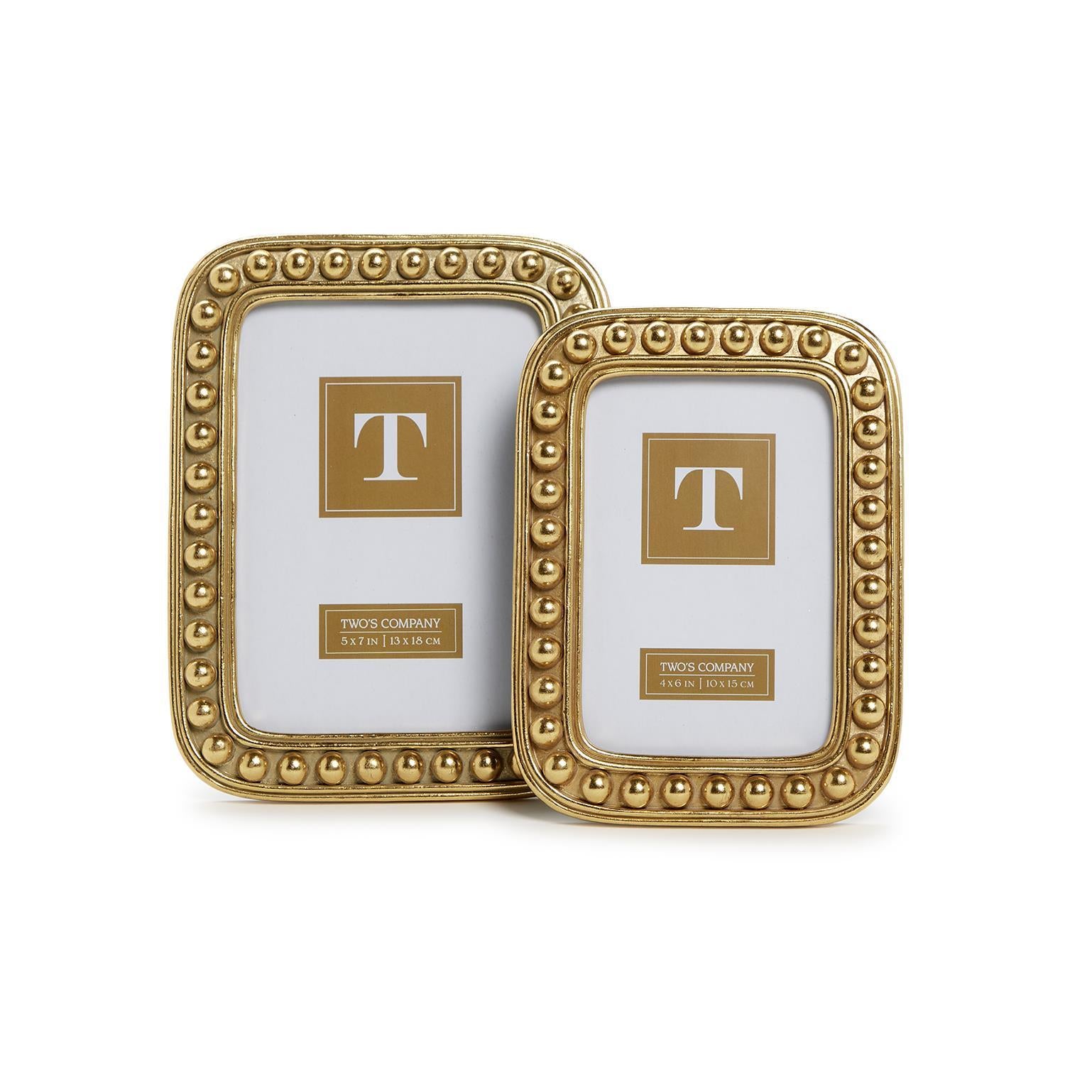 Two gold beaded rectangular picture frames of different sizes