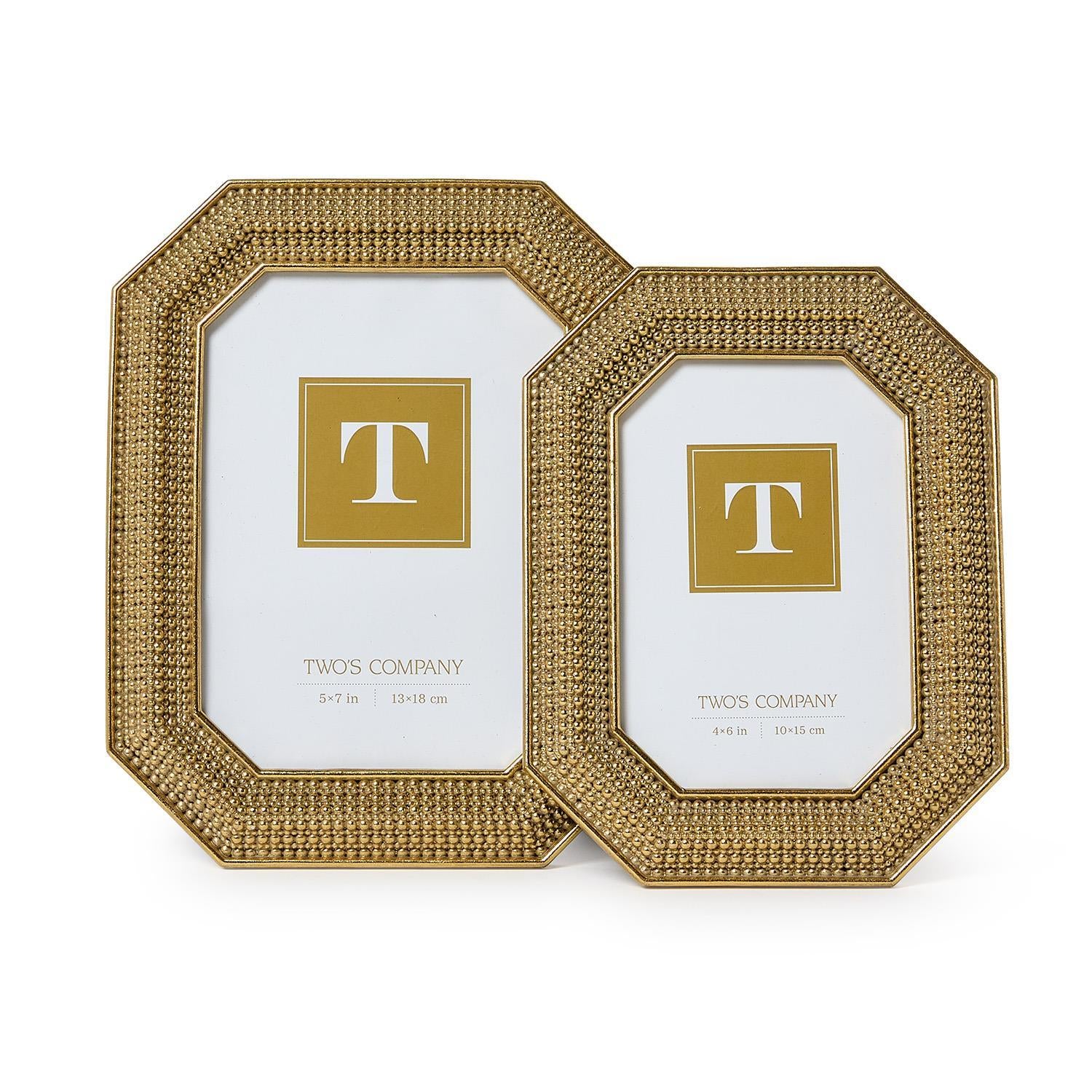 Two gold beaded octagonal picture frames of different sizes