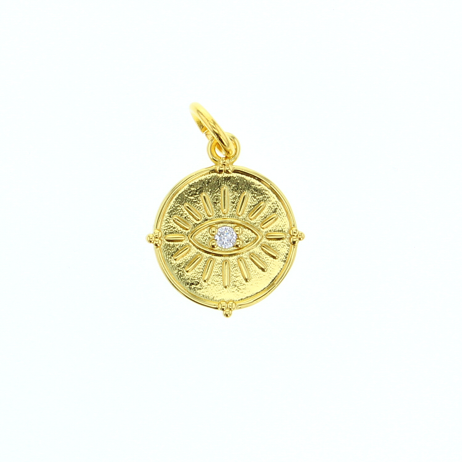 Gold jewelry pendant featuring a circular evil eye design with a bright gold finish, a single sparkling cubic zirconia stone, and radiating sunburst lines