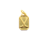 Gold-colored rectangular metal charm featuring two embossed crossed golf clubs and a small top bail