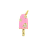A pink enamel gold tone popsicle charm featuring four pave heart details and "HAPPY" engraved on its stick
