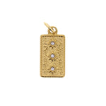 Gold rectangular pendant featuring three sparkling round diamonds set in starburst designs against an ornate textured background isolated on white