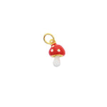 Gold-tone and enamel charm featuring a whimsical red mushroom with white polka dots and a white stem