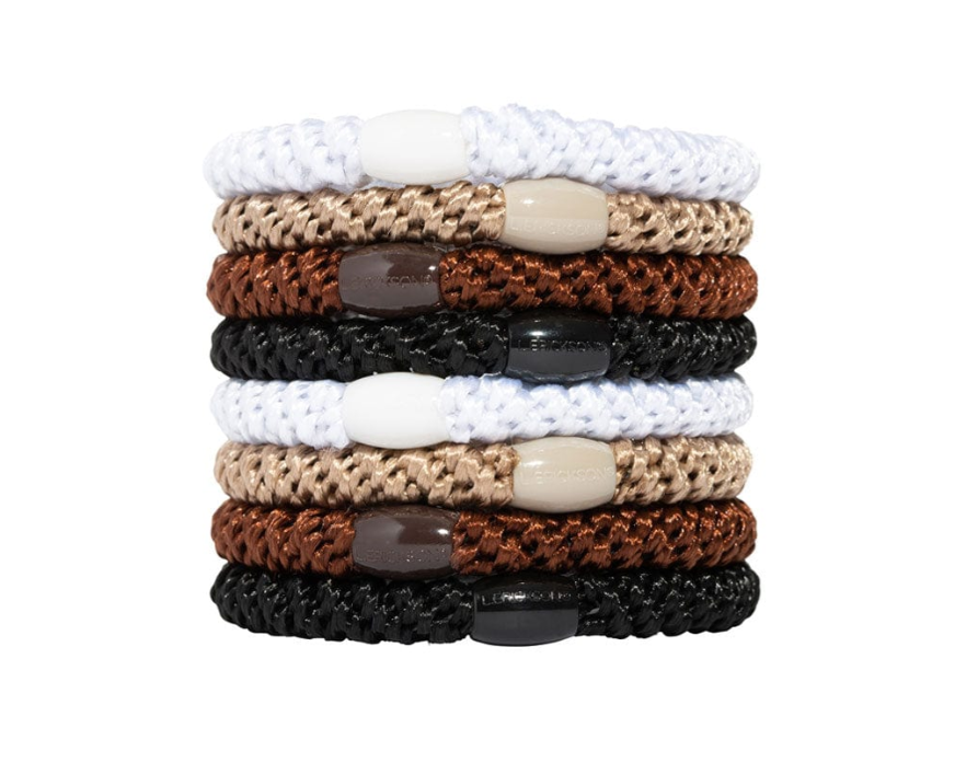 Product photography showing a vertical stack of L Erickson elastic braided hair ties in white tan brown and black with branded oval plastic beads