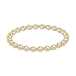 Beaded stretch bracelet featuring alternating polished larger gold beads and smaller silver beads