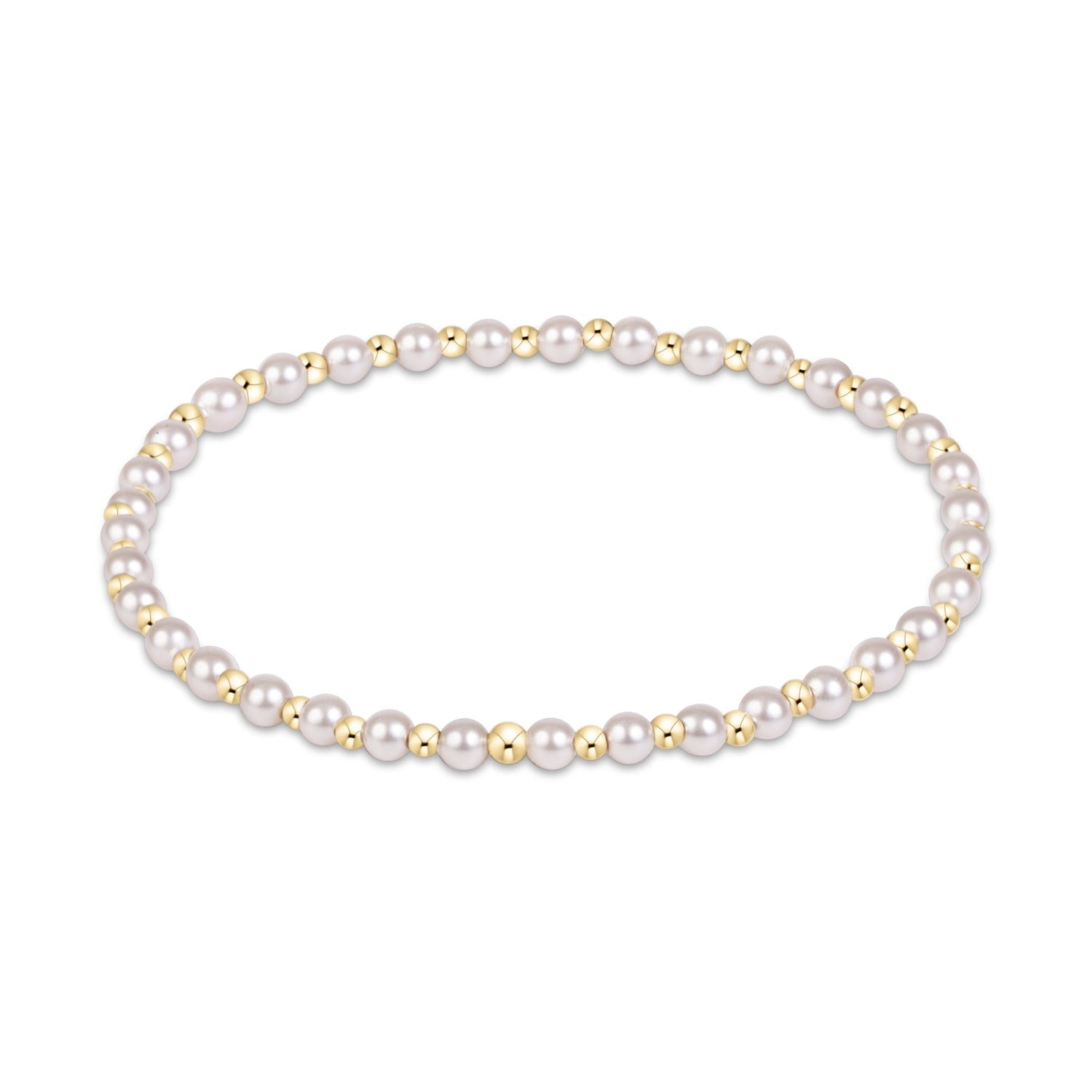 Stretch bracelet featuring alternating white pearls and small gold beads