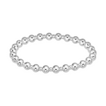 Digital product photography of a polished sterling silver beaded stretch bracelet featuring alternating bead sizes in a continuous circular design isolated on a white background