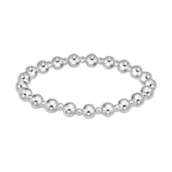 Polished silver beaded stretch bracelet with uniformly sized reflective round beads