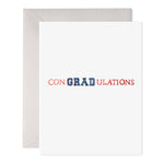 White greeting card with the text CON GRAD ULATIONS in red and blue varsity style lettering