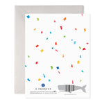 Back of greeting card with colorful confetti pattern and whale shaped barcode