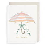 Watercolor greeting card with a striped umbrella tied with a green ribbon and the text Happy Shower