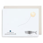 Back of greeting card with a watercolor balloon illustration and a whale shaped barcode