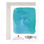Back of greeting card with blue watercolor square and whale shaped barcode