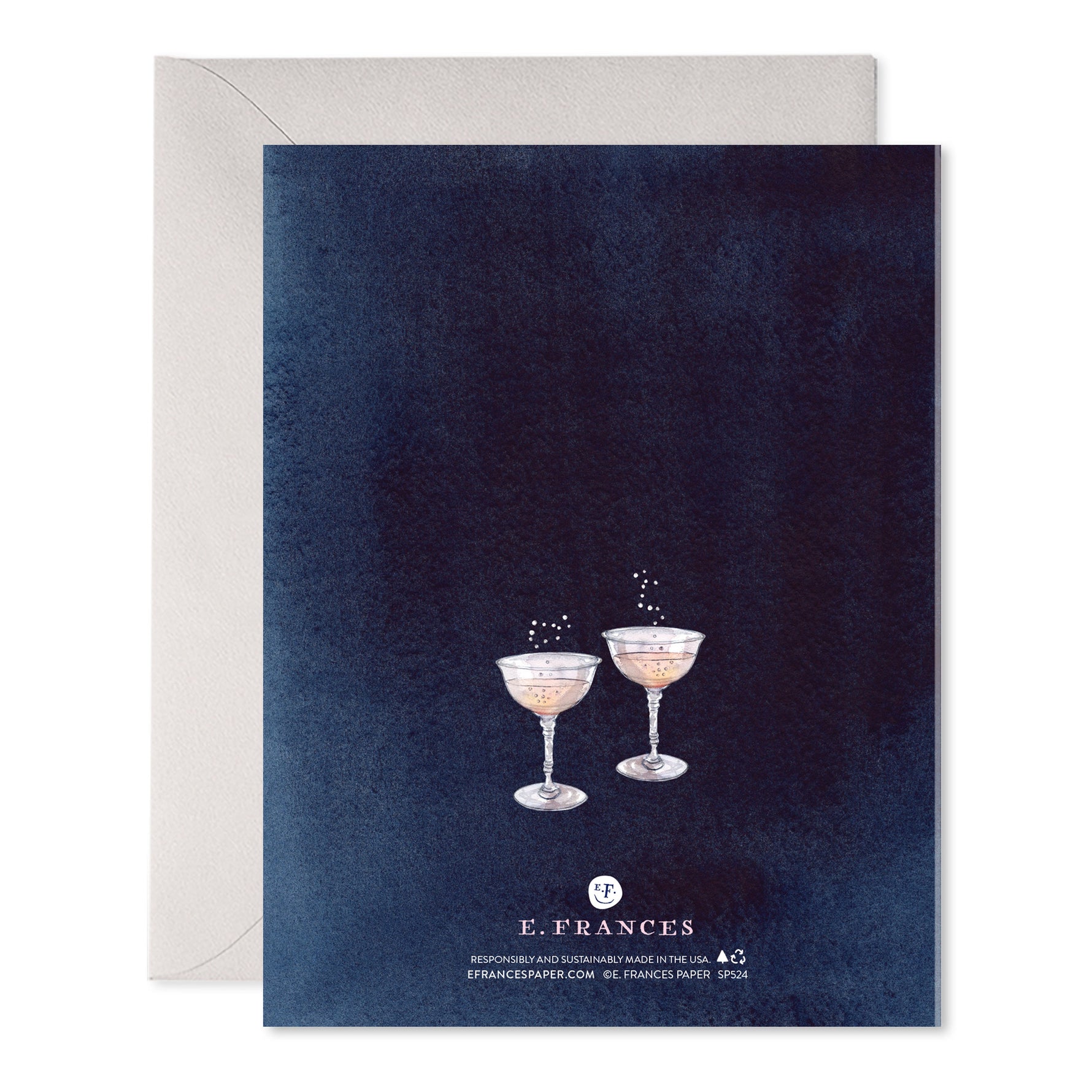 Greeting card with two champagne coupes on a dark blue background and a light grey envelope