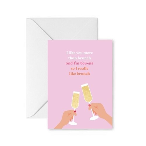 Greeting card with pink background and two hands toasting with champagne flutes