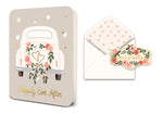Wedding greeting card with a car illustration and matching envelope with floral sticker