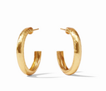 Pair of gold hoop earrings with a hammered texture